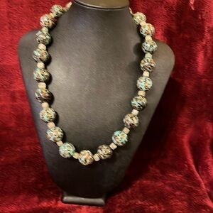 Handcrafted Beaded Necklace. Blue with Animal Print Sterling Silver Toggle.